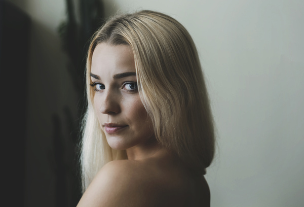 woman turned to look back Stock Photo