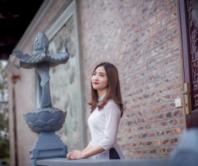 Asian girl looking into the distance sky Stock Photo