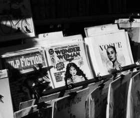 Black white picture of magazines shelf on street Stock Photo