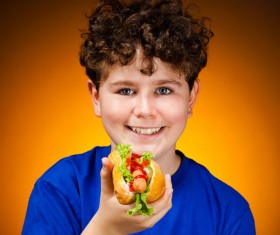 Boy eating hot dog Stock Photo 02