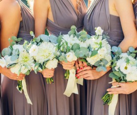 Bride and bridesmaid holding bouquet Stock Photo 03