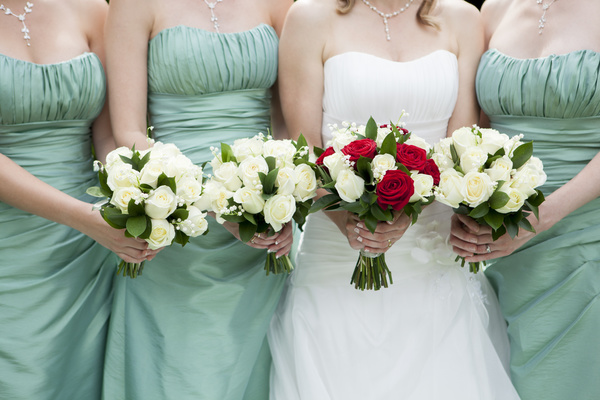 Bride and bridesmaid holding bouquet Stock Photo 04