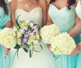 Bride and bridesmaid holding bouquet Stock Photo 05