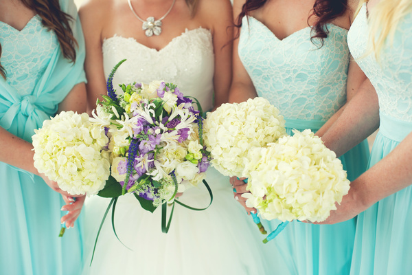 Bride and bridesmaid holding bouquet Stock Photo 05