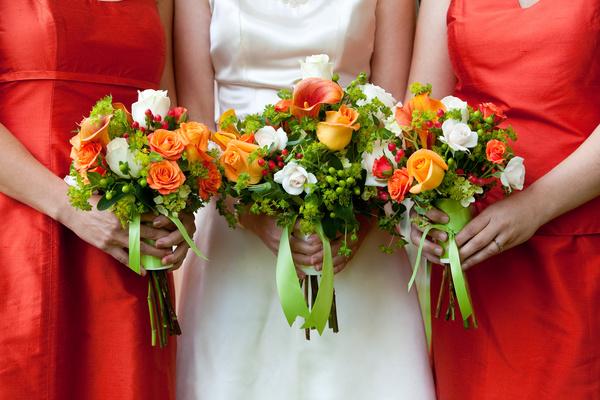 Bride and bridesmaid holding bouquet Stock Photo 06