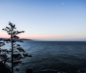 Calm beach landscape at dusk Stock Photo