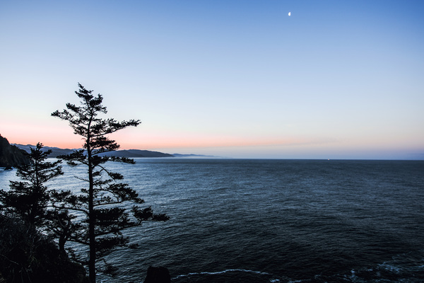 Calm beach landscape at dusk Stock Photo