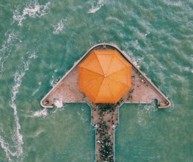 Canoe cruising on jetty area from altitude Stock Photo