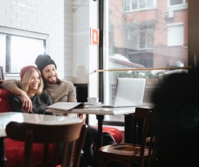 Couple drinking coffee browsing webpage Stock Photo 05