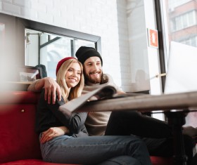 Couple drinking coffee browsing webpage Stock Photo 07