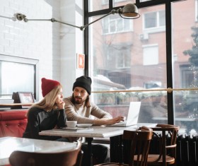 Couple drinking coffee browsing webpage Stock Photo 10