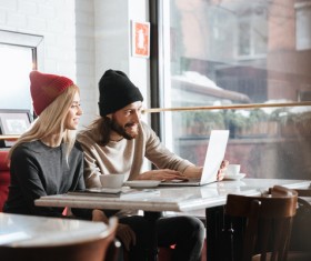 Couple drinking coffee browsing webpage Stock Photo 11