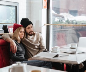 Couple drinking coffee browsing webpage Stock Photo 13