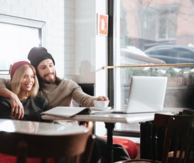 Couple drinking coffee browsing webpage Stock Photo 14