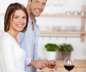 Couple making a salad in the kitchen Stock Photo