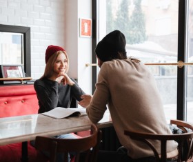 Couple talking in cafe Stock Photo 01