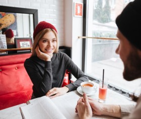 Couple talking in cafe Stock Photo 03