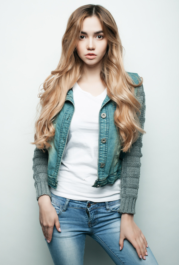 Cute girl wearing denim jacket Stock Photo 01