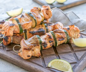Delicious kebab and green lemon Stock Photo