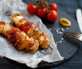 Delicious kebab and tomatoes Stock Photo