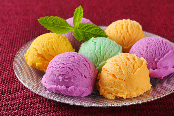 Different colors of ice cream on plate Stock Photo 01