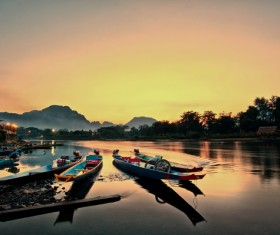 Docked boat on the shore Stock Photo