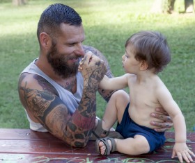 Father and child hand wrestling Stock Photo
