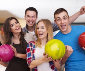 Friends bowling together Stock Photo 01