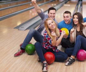 Friends bowling together Stock Photo 02