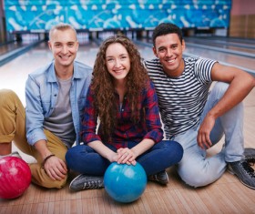 Friends bowling together Stock Photo 03