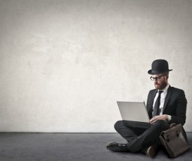 Gentleman using laptop Stock Photo