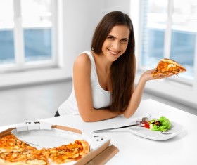 Girl eating pizza Stock Photo 01