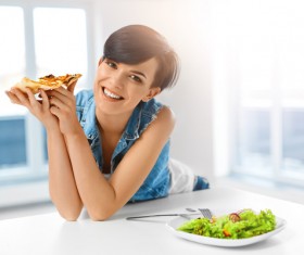 Girl eating pizza Stock Photo 02