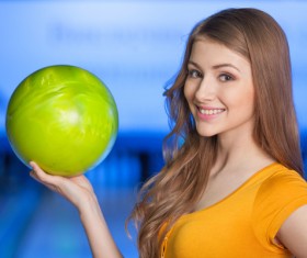 Girl holding a bowling ball Stock Photo