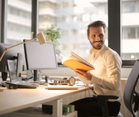 Handsome man in office Stock Photo