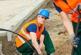 Hard work road construction workers Stock Photo 13