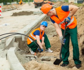 Hard work road construction workers Stock Photo 15