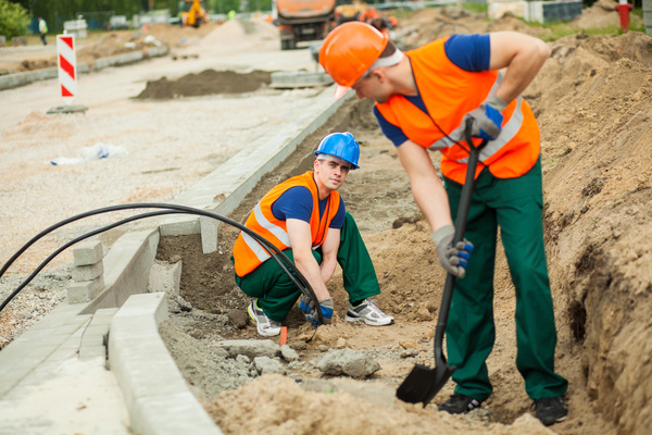 Hard work road construction workers Stock Photo 15