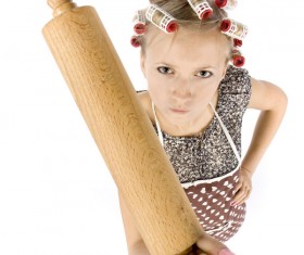 Housewife holding rolling pin Stock Photo