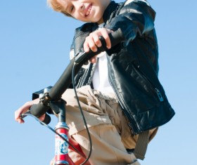 Little boy riding bicycle Stock Photo