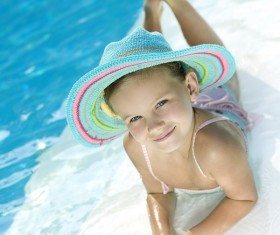 Little girl by the pool Stock Photo