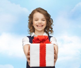 Little girl holding gift Stock Photo
