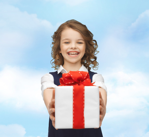 Little girl holding gift Stock Photo