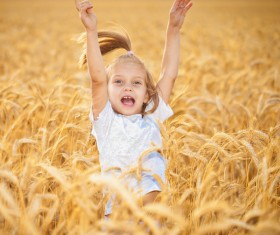 Little girl in wheat field Stock Photo 02