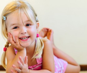 Little girl reading comic book Stock Photo