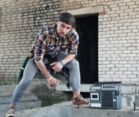 Man and vintage tape recorder Stock Photo