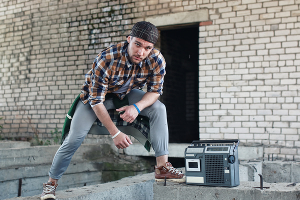 Man and vintage tape recorder Stock Photo