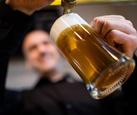 Man hands with beer close-up Stock Photo 02