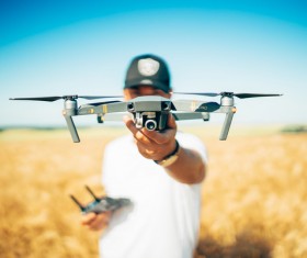 Man holding small drone Stock Photo