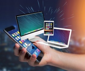 Man using laptop and smartphone Stock Photo 02